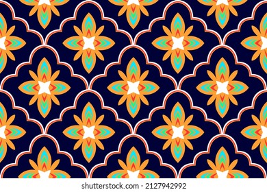 Diseño de patrones interminables de la etnia marroquí. Moqueta de tela azteca mandala ornamental chevron decoración textil papel tapiz. Antecedentes del vector tradicional del bordado del pavo tribal africano