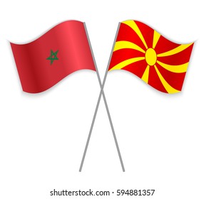 Moroccan and Macedonian crossed flags. Morocco combined with Macedonia isolated on white. Language learning, international business or travel concept.