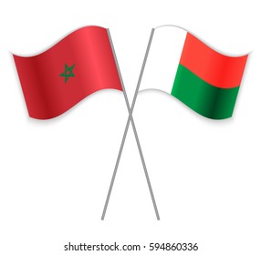 Moroccan and Malagasy crossed flags. Morocco combined with Madagascar isolated on white. Language learning, international business or travel concept.