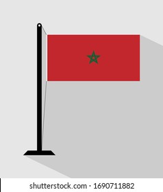 morocco flag on pole, isolated on gray background