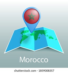 Mapa del mundo de la bandera de Marruecos en pin con el nombre del país