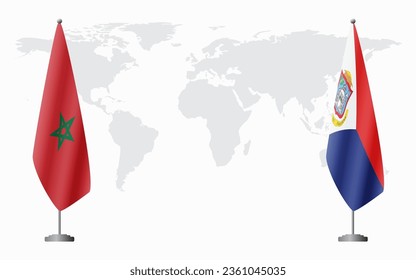 Banderas de Marruecos y San Martín para una reunión oficial contra el fondo del mapa mundial.