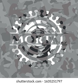 Mortal written on a grey camouflage texture