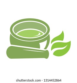 Mortar and pestle with green leaves, vector logo icon