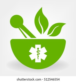 Mortar and pestle with herbs