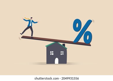 Mortgage Payment, House Loan Interest Rate Or Balance Between Income And Debt Or Loan Payment, Financial Risk Concept, Businessman Trying To Balance With Mortgage Interest Rate Percentage On The House