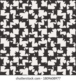 Mosaic of angular abstract shapes. Monochrome patchwork background. Textile design. Ceramic tile. Wrapping paper.