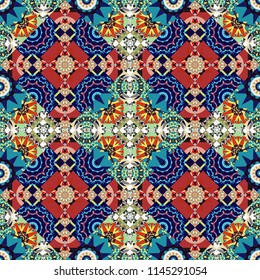 Mosaic background in red, blue and black colors. Vector abstract patch seamless pattern.