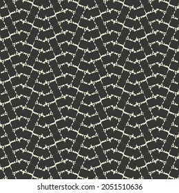 Mosaic design composed of square pieces arranged after a zigzag path. Retro textile pattern in black and white.