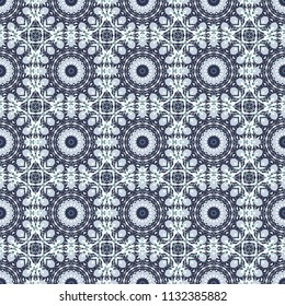 Mosaic, embroidery, wallpaper, kaleidoscope, mandala. Seamless pattern made of small squares on the background. Vector pixel oriental mandala in violet, blue and white colors. Vector illustration.