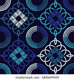 Mosaic with geometric shapes. Seamless pattern. Design with manual hatching. Textile. Ethnic boho ornament. Vector illustration for web design or print.