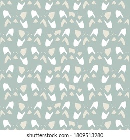 Mosaic made up of different patches, without having a well-defined pattern. Textile design. Mottled background.