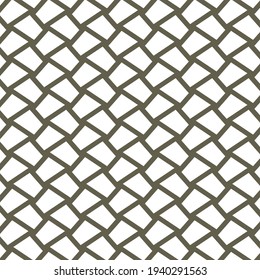 Mosaico hecho de piezas blancas en forma de cuadrángulo irregular. Baldosa del suelo.