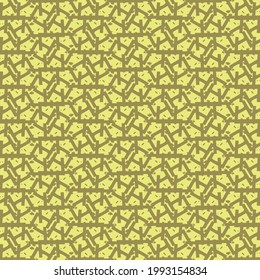Mosaic pattern consisting of broken lines and flecks. Golden wallpaper texture.