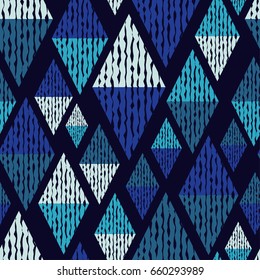 Mosaic of triangles. Seamless abstract geometric pattern. Vector illustration. Textile rapport.