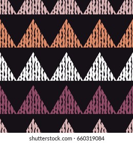 Mosaic of triangles. Seamless abstract geometric pattern. Vector illustration. Textile rapport.
