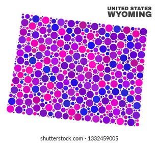 Mosaic Wyoming State map isolated on a white background. Vector geographic abstraction in pink and violet colors. Mosaic of Wyoming State map combined of scattered spheric items.