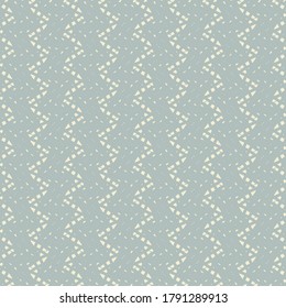Mosaic with zigzag strips or stripes made up of very small pieces. Pattern in light blue and white. Textile design.