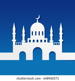 Mosque made by paper cut out on blue background