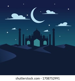 mosque in the middle of the desert at night