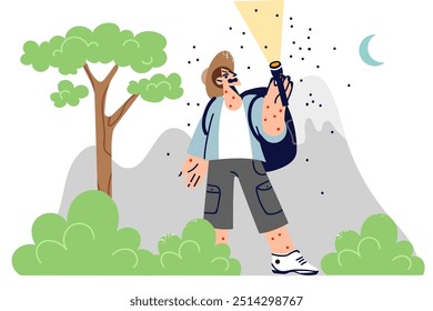 Mosquitoes and insects anger tourist by flocking to light from lantern in evening forest. Angry man went on hike became victim mosquitoes bit guy at risk of contracting malaria or dengue disease