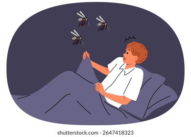 Mosquitoes will attack sleeping man lying in bed, and horrified by sight of giant flying insects. Guy nightmare with malaria mosquitoes carrying infections that cause illness or death