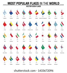 Most popular flags in the world. Desk flags on white background.