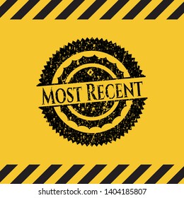 Most Recent black grunge emblem with yellow background. Vector Illustration. Detailed.