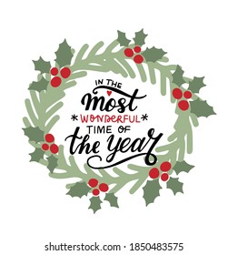 In the most wonderful time of the year. Christmas wreathe and hand lettering holiday greeting quote. Modern calligraphy. Congrats cards design element. Xmas phrase