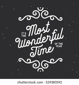 It is the most wonderful time of the year lettering. Christmas related greeting card with typography and calligraphy. Winter season quote. Vector vintage illustration.