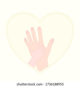 Mother and baby hand Is holding together  In the light yellow heart. Love and trust in family. Motherhood bonding. Donate, encouragement, hospital concept.