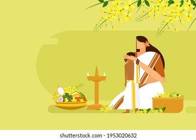 Mother blindfolds her son in front of auspicious items. A traditional ritual during the 'Vishu' festival in Kerala