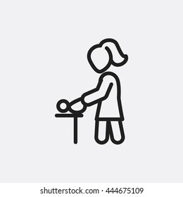 Mother changing baby Icon