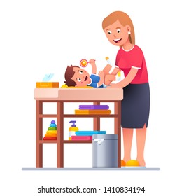 Mother changing diaper to happy smiling toddler baby boy playing rattle toy. Baby nappy child changing table with wet tissue, clean towels. New born son parenting. Flat vector character illustration