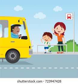 Mother and child at the bus stop gesturing to the school bus