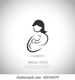 Mother and child icon or logo.