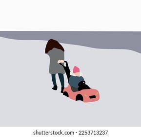 Mother and child are playing with a toy car outdoors in the snow during the winter season. Family playing outdoors. Healthy child enjoying