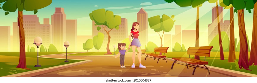 Mother with child walk in city park