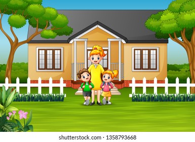 Mother and children in front a house