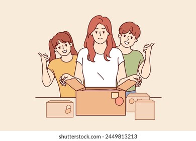 Mother and children prepare donation boxes, wanting to be useful to society and volunteer. Happy family calls for donation to charitable foundations that need help from caring people