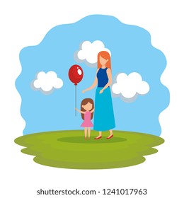 mother with daughter and balloon helium in park