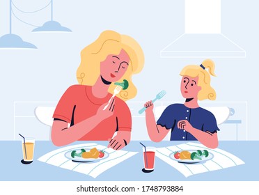 Mother and daughter enjoying their meal, consisting of tomatoes, broccoli, mashed potatoes.