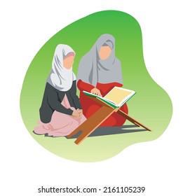 Mother and daughter learn to read the holy book Al Quran