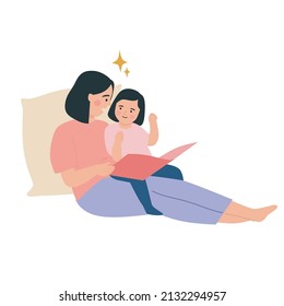 Mother and daughter reading book together