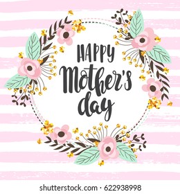 Mother day concept with hand written text "happy mother's day" and a wreath made of pink and gold abstract flowers with sparkles on a striped background. Vector illustration.