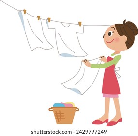 Mother drying washed clothes outside