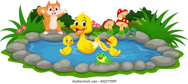 Mother duck and little ducklings swimming in the pond