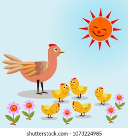 Mother hen and chicks under the sun. 