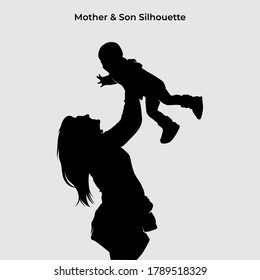 Mother holding the child silhouette. Love symbol of family on black color. Eps 10. Holiday background element.