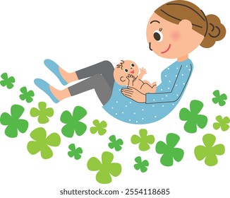 A mother holding her baby on top of a four-leaf clover